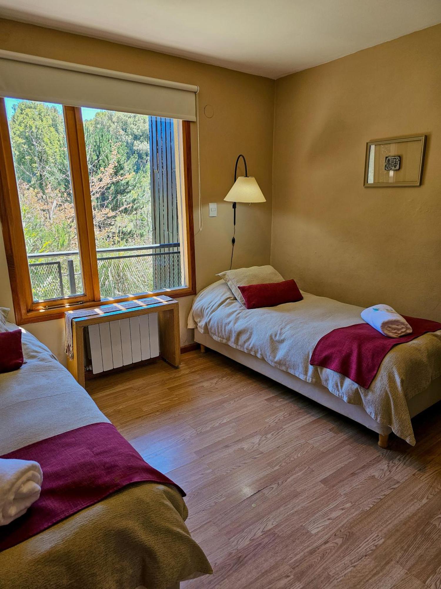 Das Rosenhaus Apart Hotel By Rosas Blancas San Martín de los Andes Rom bilde